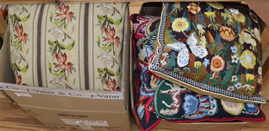 Seventeen needlepoint cushions